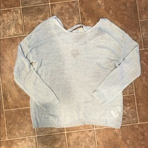light blue sweater